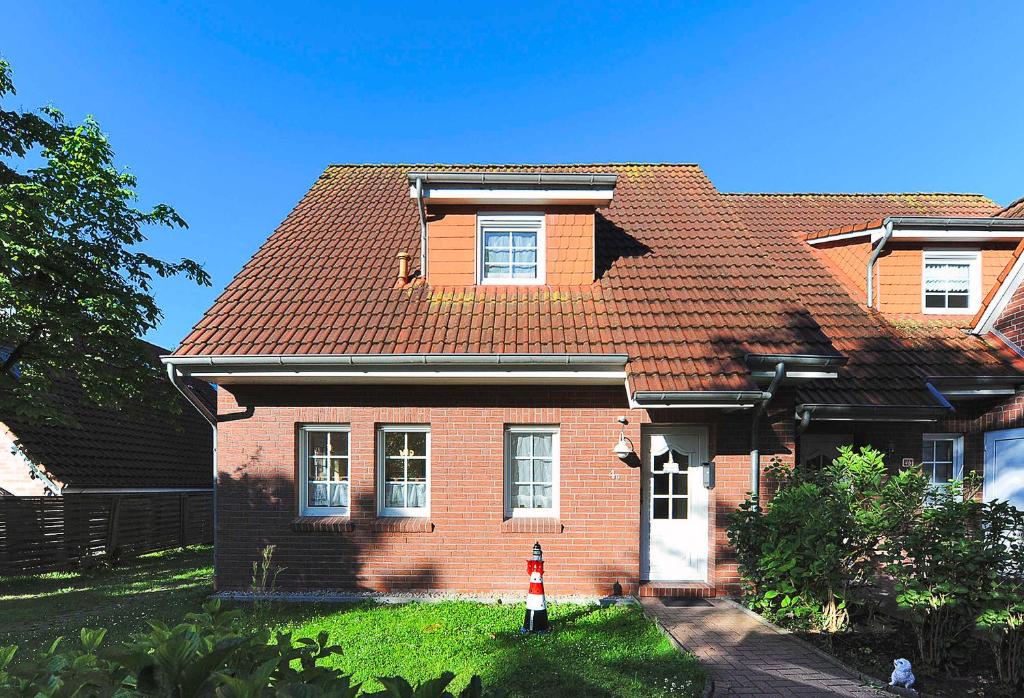 Ferienhaus Strandkorb An der Brücke 4a, 26427 Esens