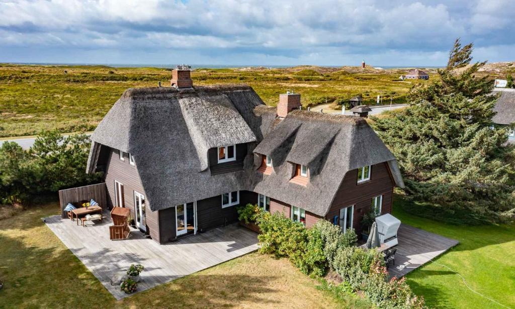 Ferienhaus Uthlandlodge - reetgedecktes Inselglueck in Kampen Sylt Hauptstraße, 24, 25999 Kampen