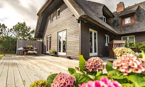 Ferienhaus Uthlandlodge - reetgedecktes Inselglueck in Kampen Sylt