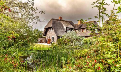 Ferienhaus Uthlandlodge - reetgedecktes Inselglueck in Kampen Sylt