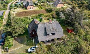 Ferienhaus Uthlandlodge - reetgedecktes Inselglueck in Kampen Sylt