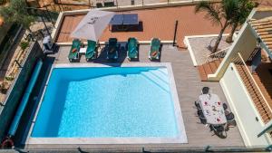 Maison de vacances Five Bedrooms Villa, heated pool, Hot Tub and Free WIFI, lots of space Sitio dos Barrancos 220-A 8200-412 Guia Algarve