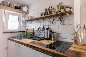 Gemütliches Tinyhouse Bungalow mit Kamin & Sauna am See