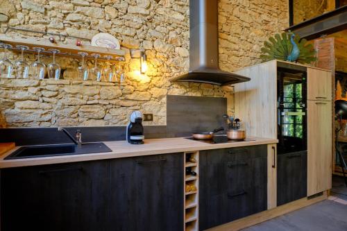 GITE de L'ATELIER LOFT INDUSTRIEL CLIMATISE PISCINE INTERIEURE PRIVEE TERRASSE