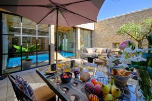 GITE de L'ATELIER LOFT INDUSTRIEL CLIMATISE PISCINE INTERIEURE PRIVEE TERRASSE