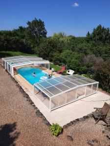 Maison de vacances Gîte La Pironnière - Piscine, Nature, au bord de la Rivière La Pironnière 49220 Montreuil-sur-Maine Pays de la Loire