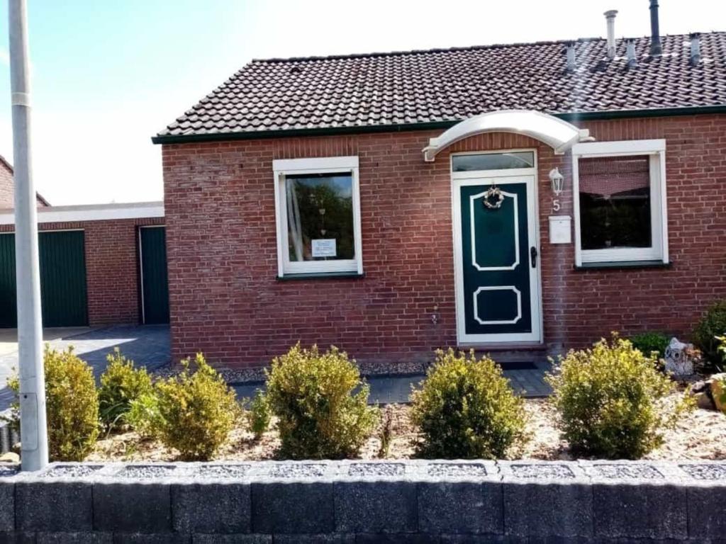 Haus am See - Ferienhaus Eule an der Nordsee Ostfriesland Eulenweg 5, 26524 Berumbur