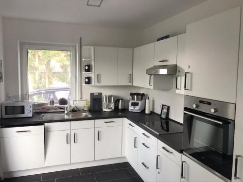 Haus Willy Dornum mit Wintergarten und Wallbox