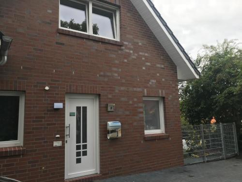 Haus Willy Dornum mit Wintergarten und Wallbox