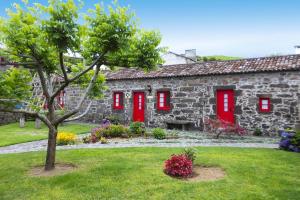 Holiday home in Lomba da Fazenda with a garden