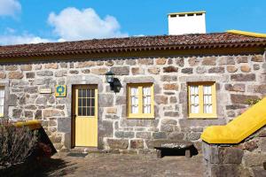 Holiday home in Lomba da Fazenda with a garden