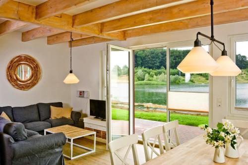 Holiday homes by the lake in the Geesthof holiday park, Hechthausen