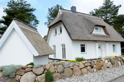 Idylle unterm Reet - Reetdachhäuser am Walde