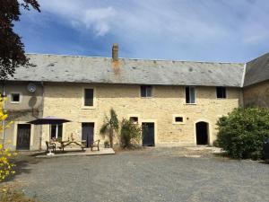Inviting Holiday Home in Osmanville with Fenced Garden