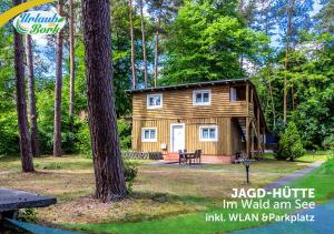 Jagd-Angler-Holzhaus-im-Wald-am-See
