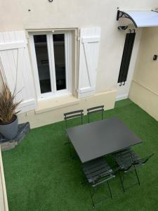 L’escapade : maison centre-ville avec cour