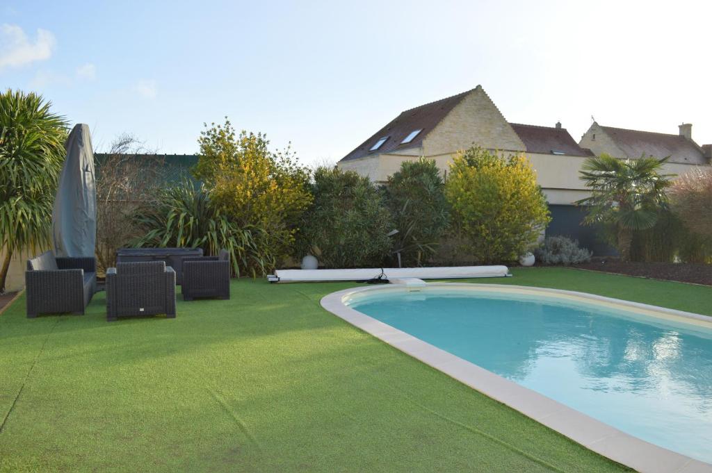 Maison de vacances L'Obélix - Piscine, jacuzzi, billard, proche plage 1 Rue du Molot 14480 Banville