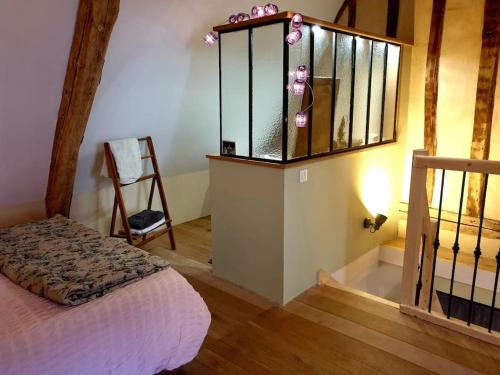La Dragonne, une chambre à Bellême, jardin et cuisine équipée
