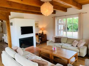 Landhaus am Achterwasser mit Bootssteg