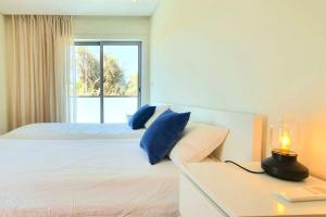Maison de vacances LovelyStay - Modern 3Bedroom Duplex W/Pool Urbanização Quinta do Rogel Lote 8 8365-307 Alcantarilha Algarve