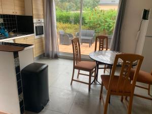 Magnifique bas de maison deux chambres situé prés des plages et du golf