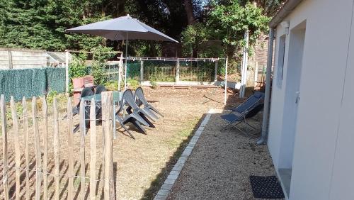 Maison avec jardinet dans un cadre verdoyant