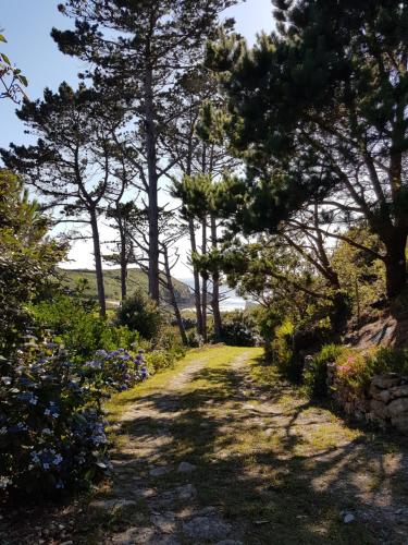 Maison blanche avec vue panoramique sur l'océan