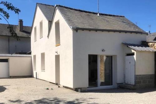 Maison cœur de ville, proche de tout commerce