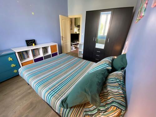 Maison chaleureuse avec grand jardin, 5 minutes à pied de la plage des sables blancs