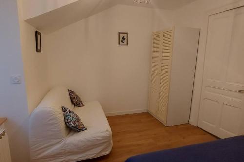 Maison chien assis