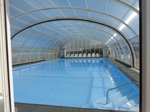 maison climatisée avec piscine