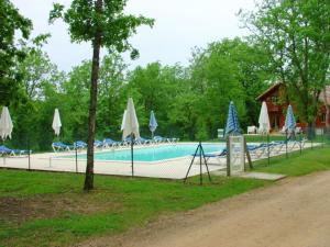 Maison de 2 chambres avec vue sur le lac piscine partagee et jardin amenage a Lachapelle Auzac