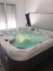 Maison de 4 chambres avec jacuzzi jardin clos et wifi a Breville sur Mer a 1 km de la plage