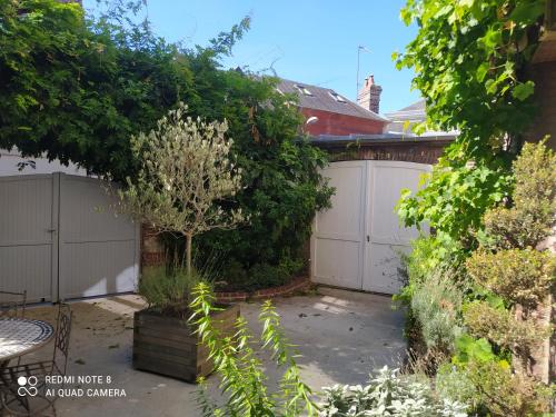 Maison de maître, un coin de verdure en hyper centre
