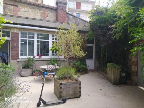 Maison de maître, un coin de verdure en hyper centre