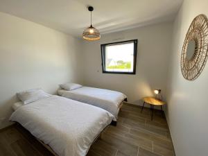 Maison de plain pied, entre terre et mer