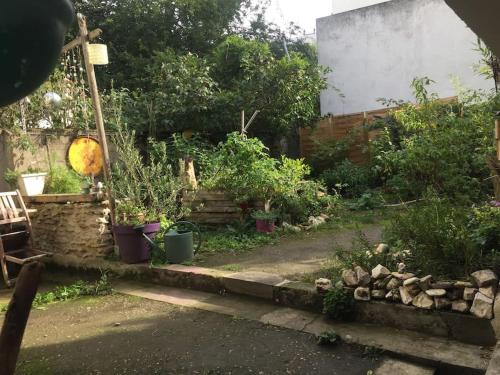 Maison douce et atypique avec son jardin à Tours
