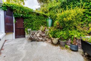 Maison familiale au calme avec beau jardin arboré
