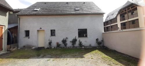 Maison familiale au centre de Loudenvielle