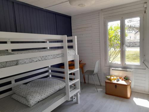 Maison les pieds dans la mer
