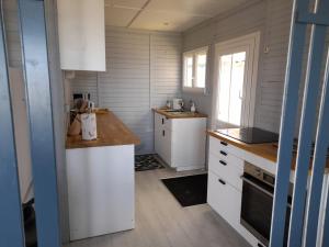 Maison les pieds dans la mer