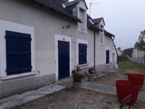 Maison plein pied dans bourg avec tous commerces
