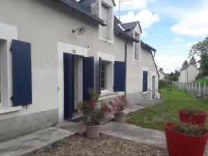 Maison plein pied dans bourg avec tous commerces