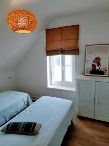 Maison rénovée avec jardin proche grande plage