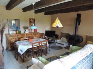 Maison Rouge Adossee a la Colline et son Etang