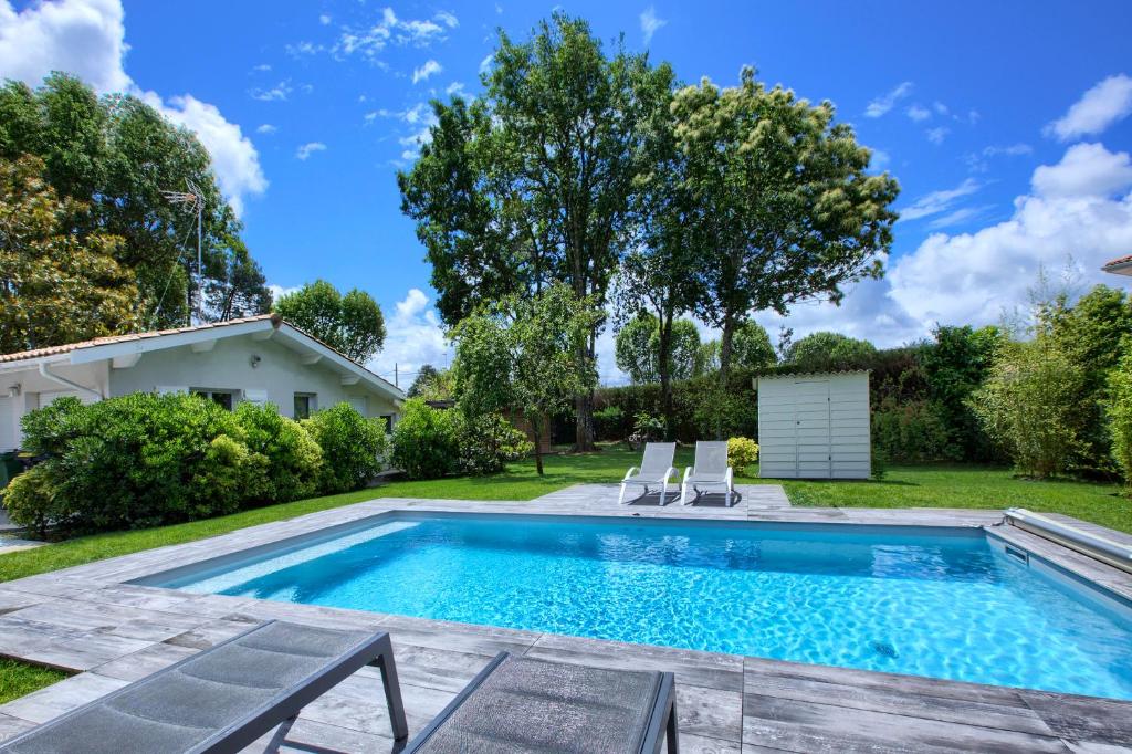 Maison de vacances Maison tout confort avec accès piscine chauffée 5 Rue Jacques Brel 33510 Andernos-les-Bains