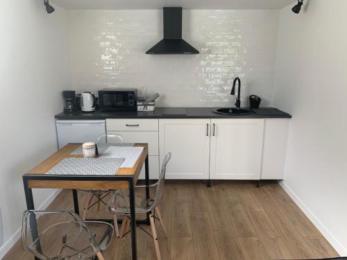 Maisonnette avec un joli jardin