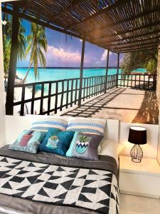 MAISONNETTE VUE MER PIEDS DANS L'EAU WIFI