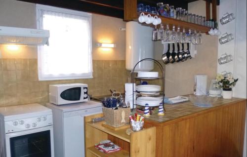 Nice home in Anneville sur Mer with 2 Bedrooms