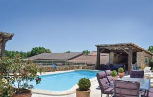 Nice home in Augignac with 3 Bedrooms, Private swimming pool and Outdoor swimming pool